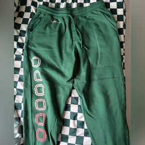 Green Sweatpants with Graphic Design